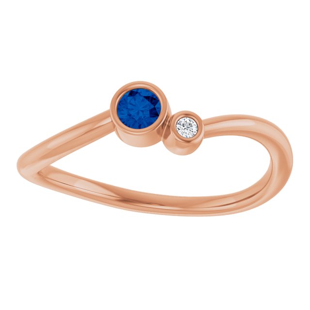 Lab-Grown Blue Sapphire Round Accented Bezel-Set Ring in 14K Rose Gold